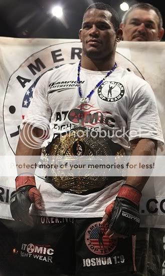 Hector Lombard with belt (Dave Mandel & Sherdog)